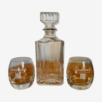 Vintage whisky decanter and its two glasses