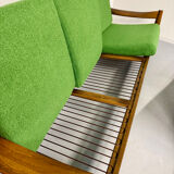 Living room sofa and Scandinavian design armchairs from the 1960s in green boucle.