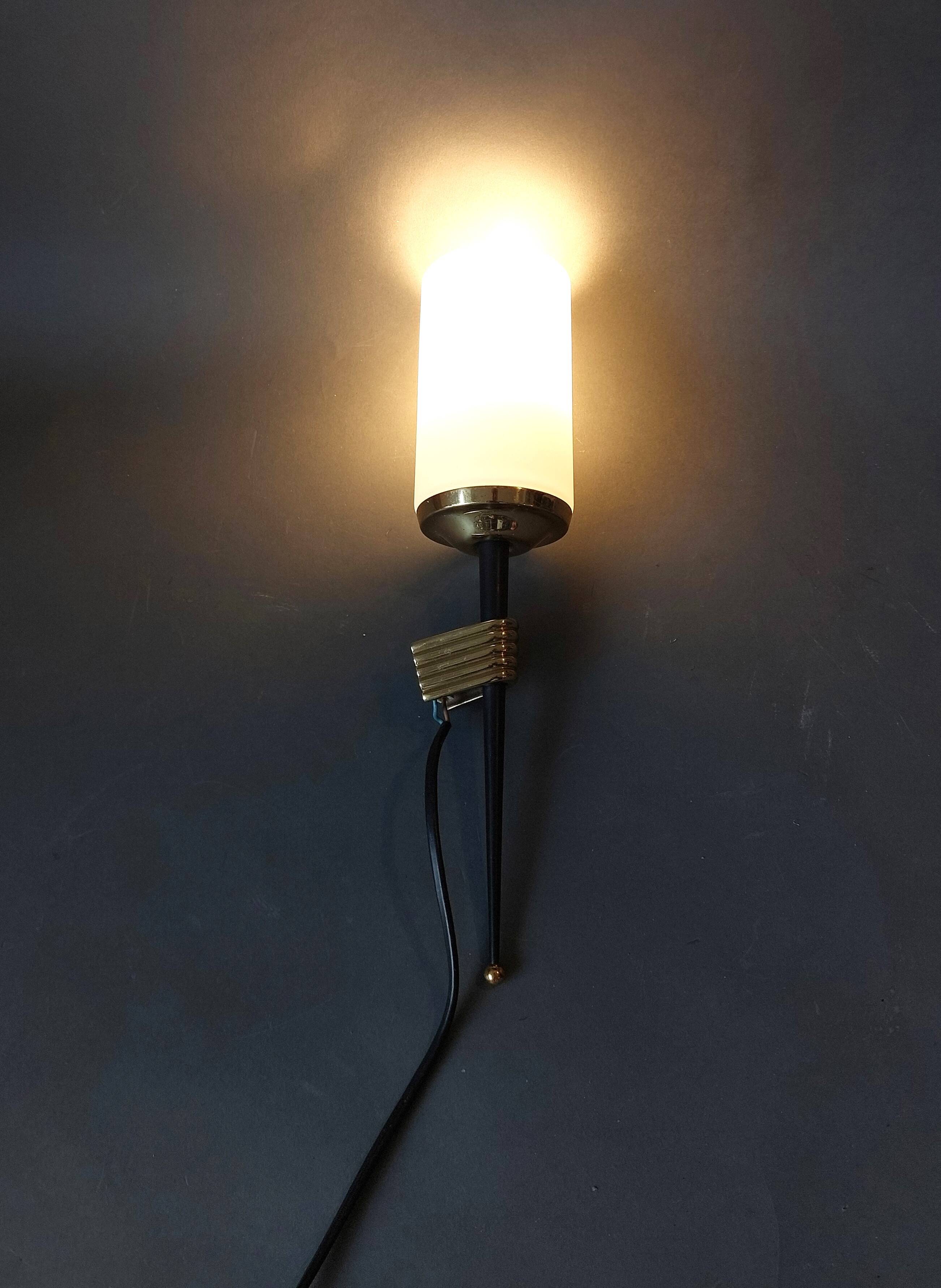 1960 torch wall light in gilded brass, metal and white opaline.