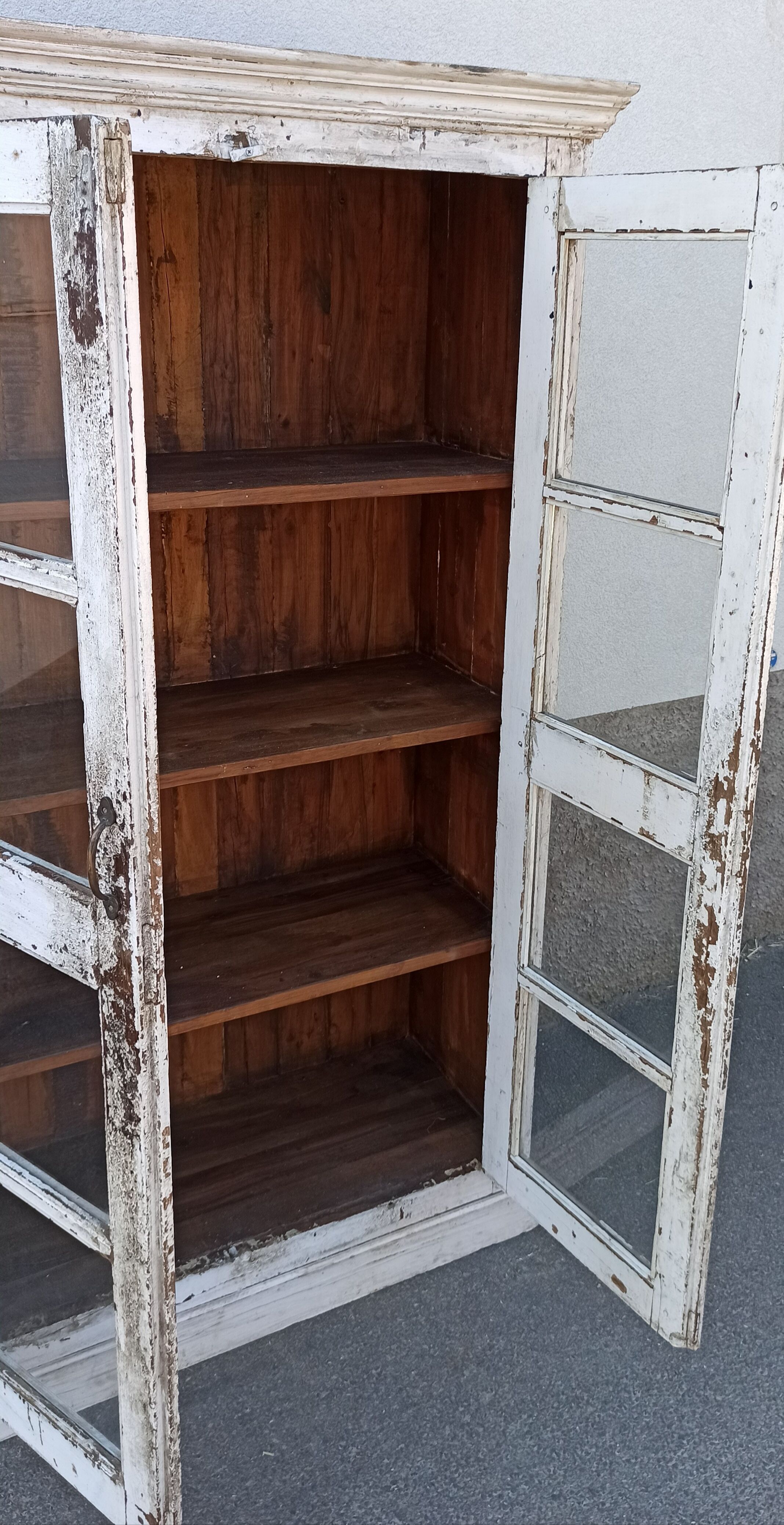 White wooden antique glazed wardrobe