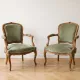 Pair of cabriolet armchairs in Louis XV style in green velvet.