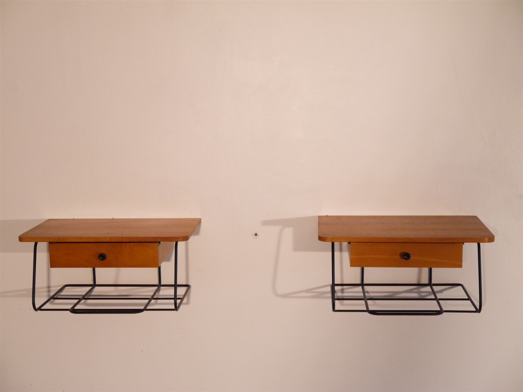 Scandinavian vintage hanging bedside pair in teak and metal