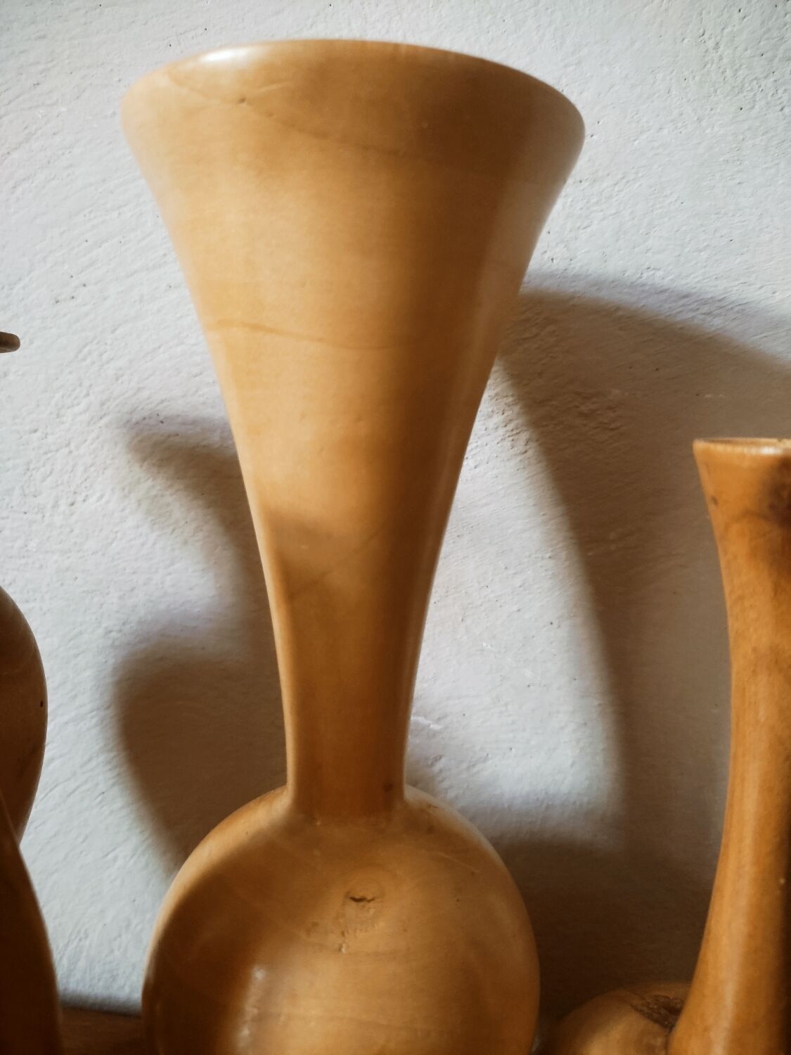 Set of 4 turned wooden vases