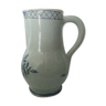 Pitcher in faience of Rouen decor has the trash 20 eme