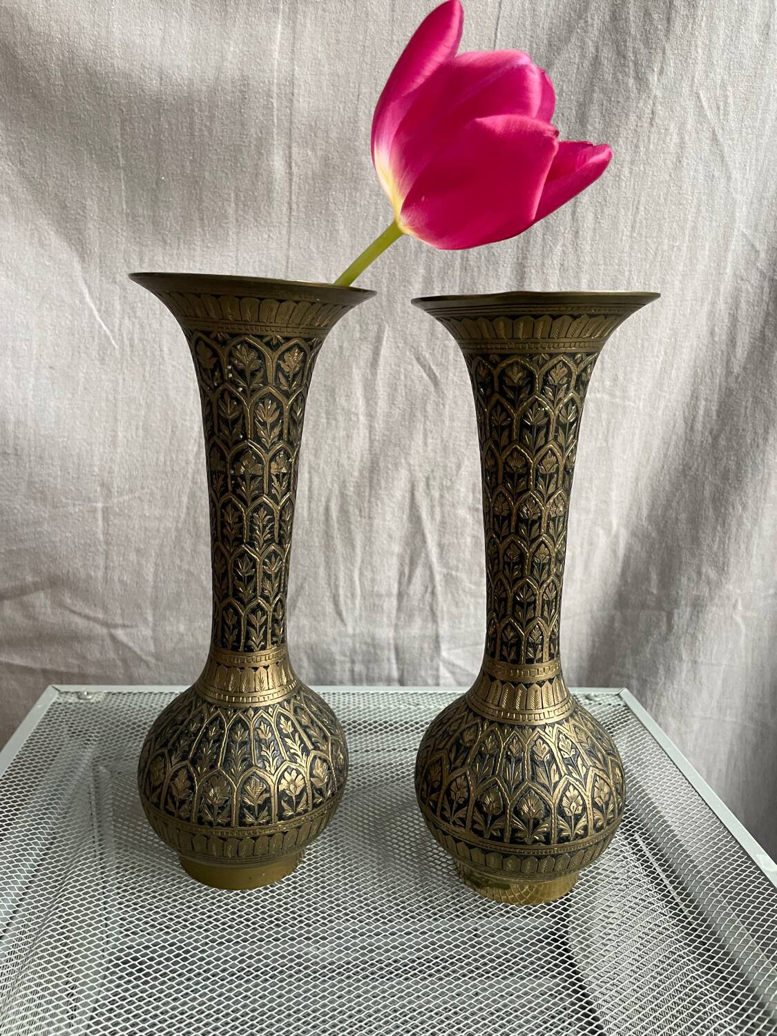Pair of black and gold metal vase
