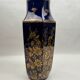 Octagonal vase in Limoges porcelain, oven blue and gold decoration, 20th century