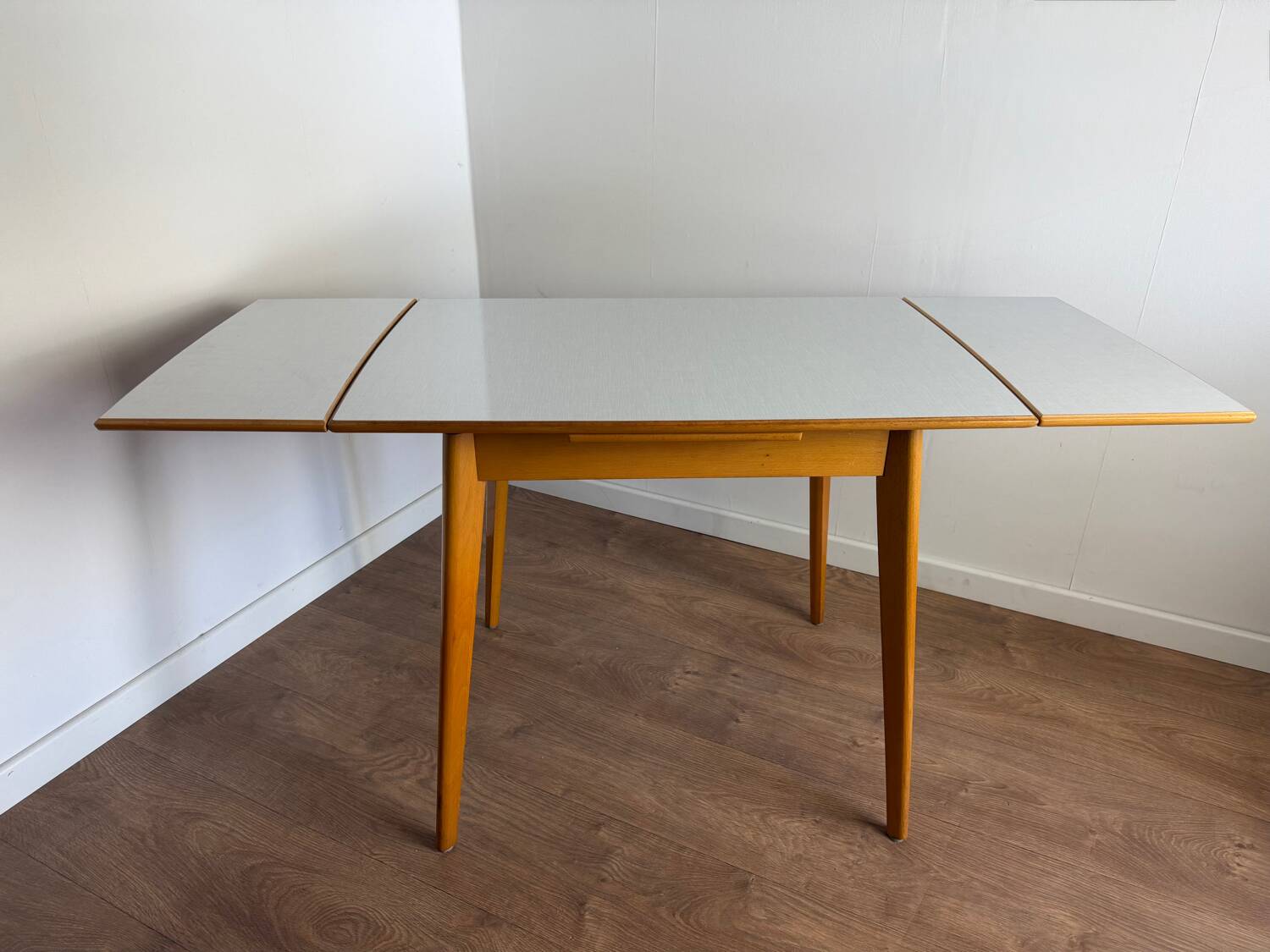 Dining table with extensions