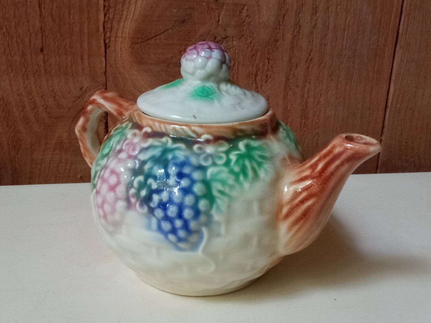 Antique teapot in slip