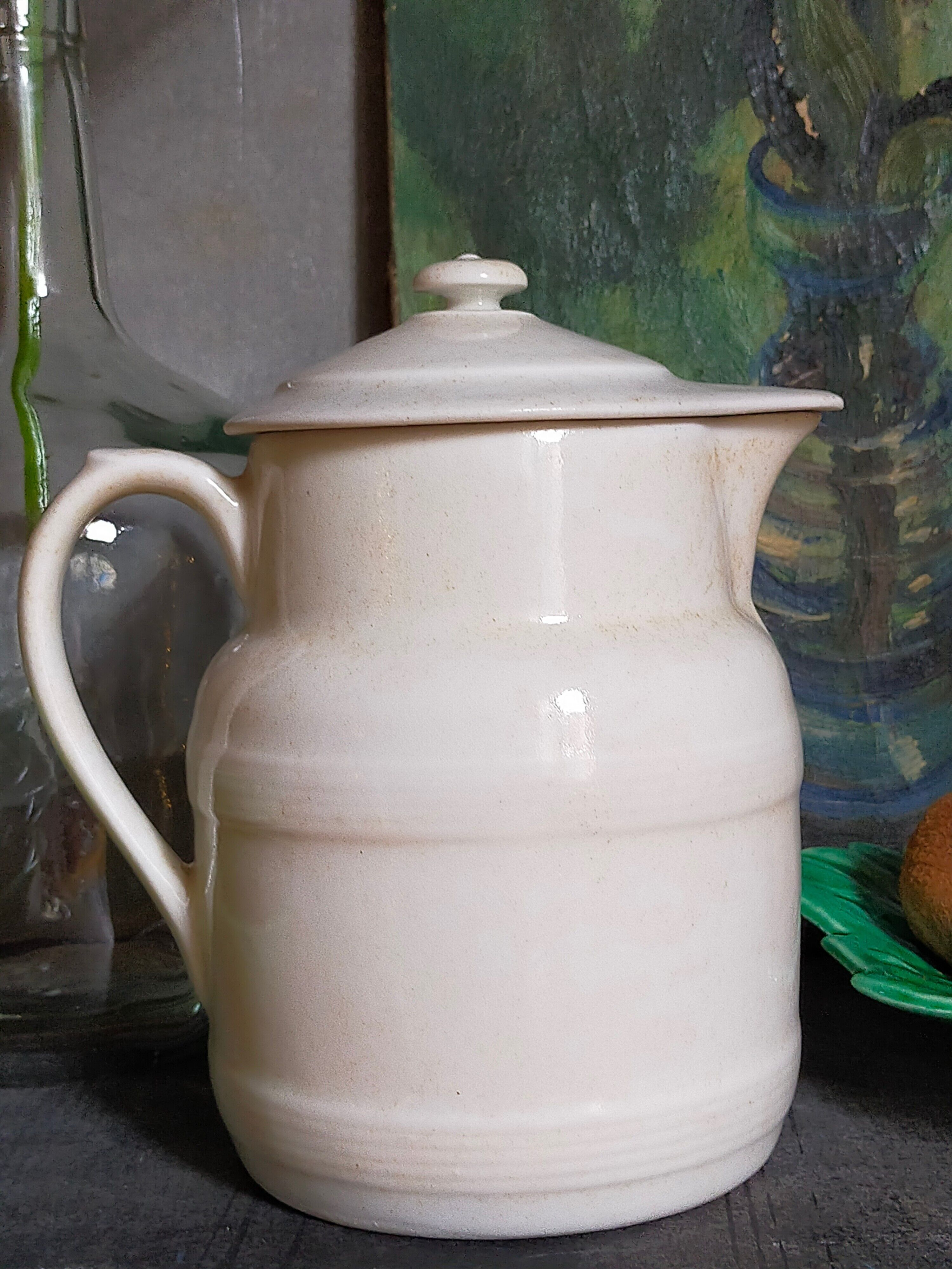 Covered pitcher in porcelain fire of Grigny XIXth stamped P.Precious