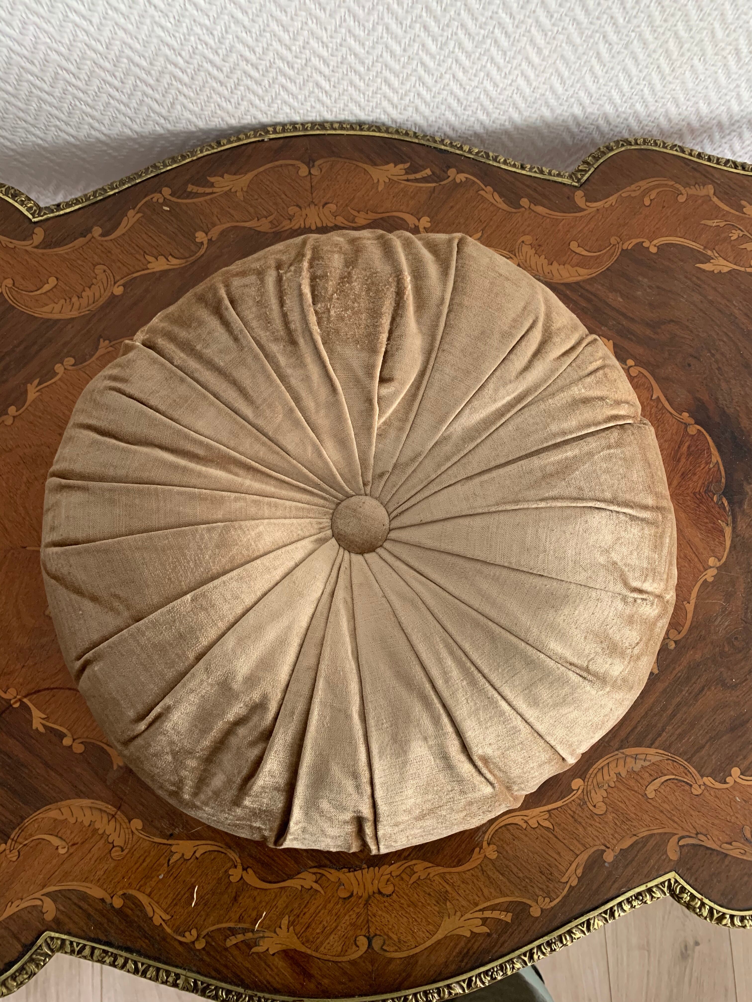 Gold lamé round velvet cushion