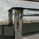 Vintage coffee table with smoked glass and chrome.