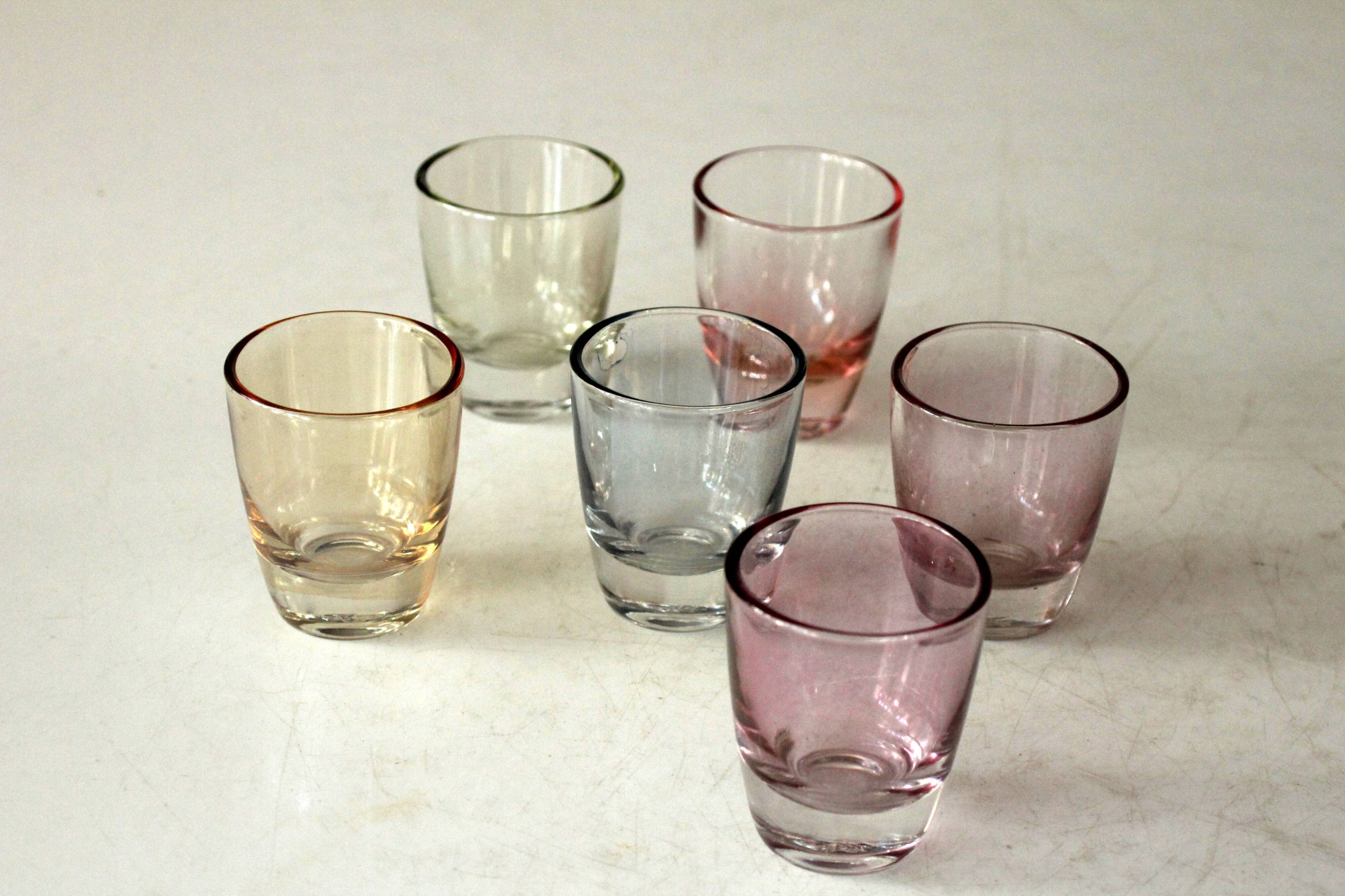6 spirit glasses on a metal tray 1950