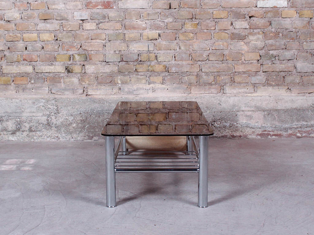 Glass rectangle coffee table with magazine rack, circa 1970