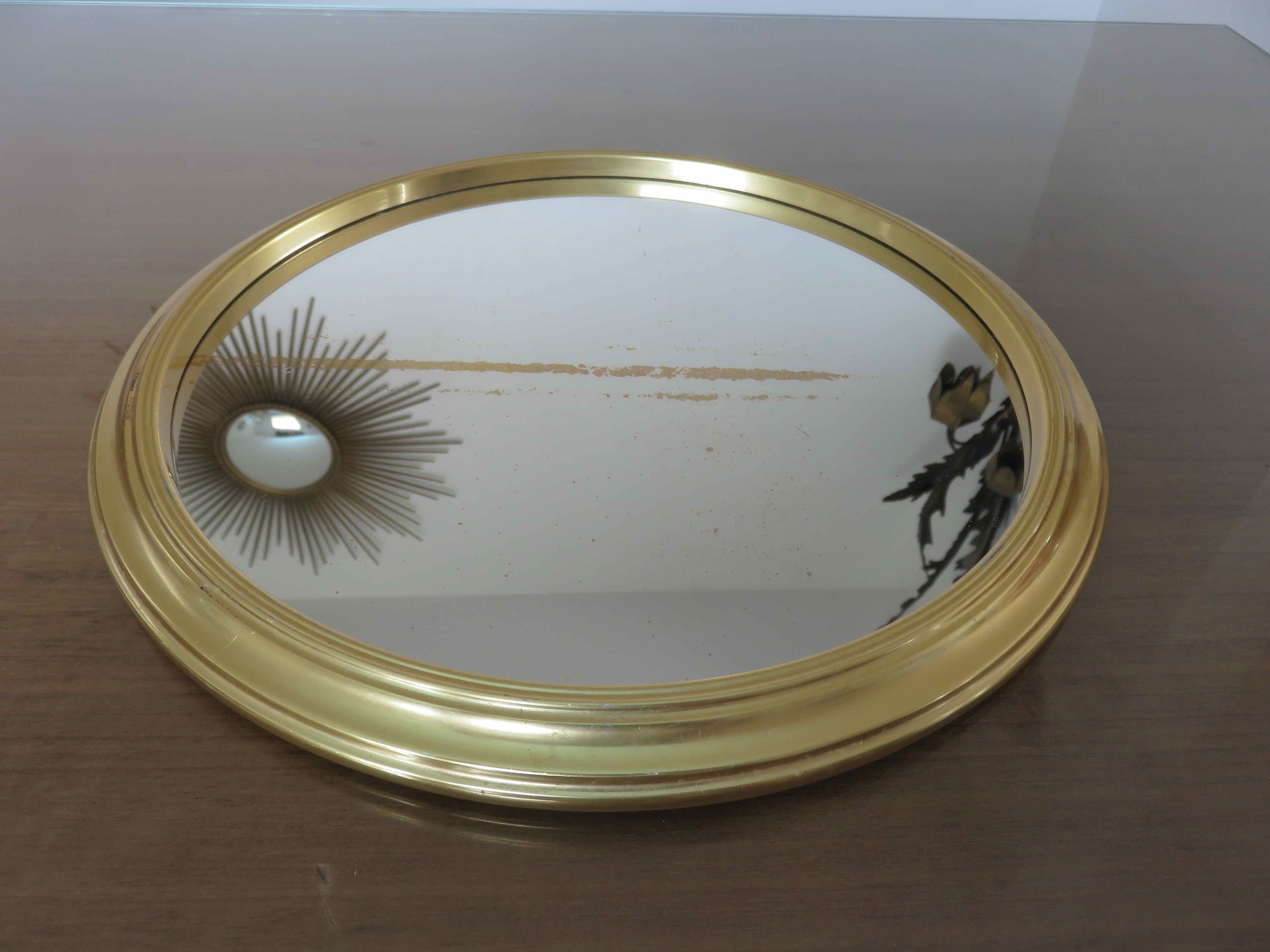 Round mirror top in gilded aluminum art deco