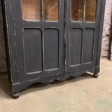 Former black patinated showcase