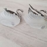 Two frosted glass swan salt cellars with silver plating.