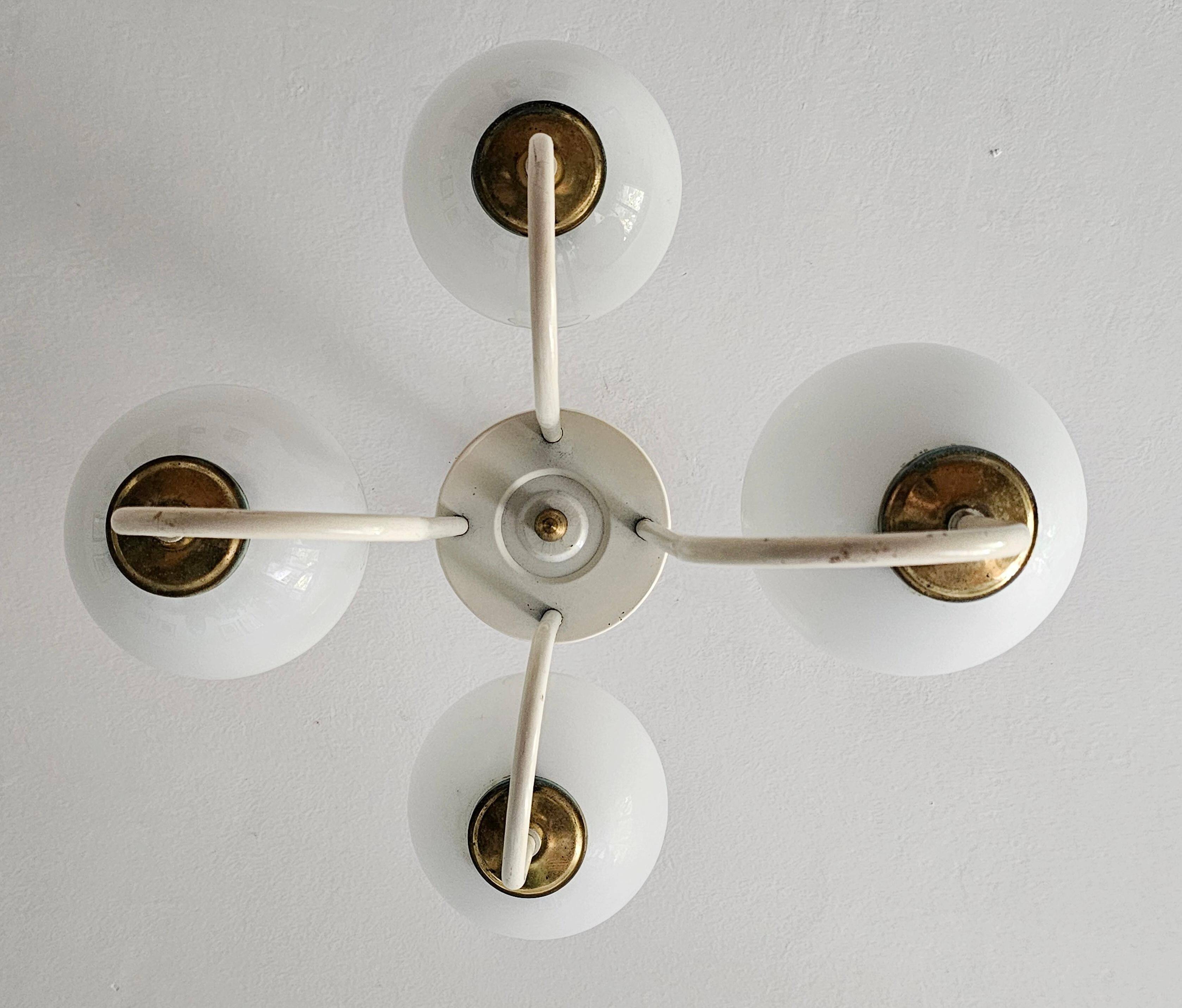 Mid-century modern chandelier with opaline glass balls.