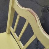 Pair of wooden and yellow formica chairs