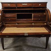 Important cylinder desk secretary in Louis XVI style made of mahogany with a system.
