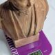 Bust of a notable in terracotta, 29 cm, signed Pasquet, 1870, on a base.