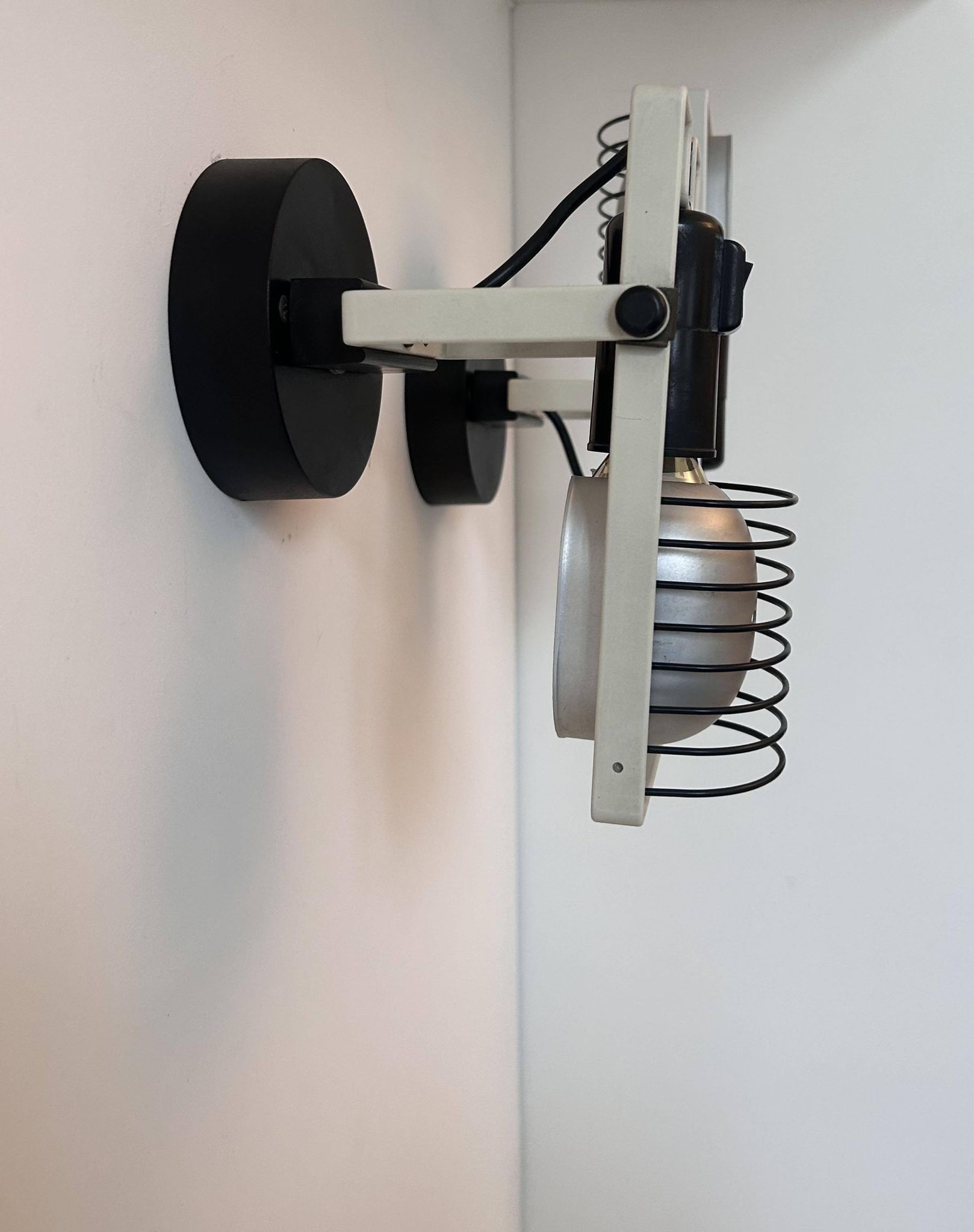 Pair of vintage Sintesi adjustable wall lights, by Gismonti for Artemide, Italy 1975