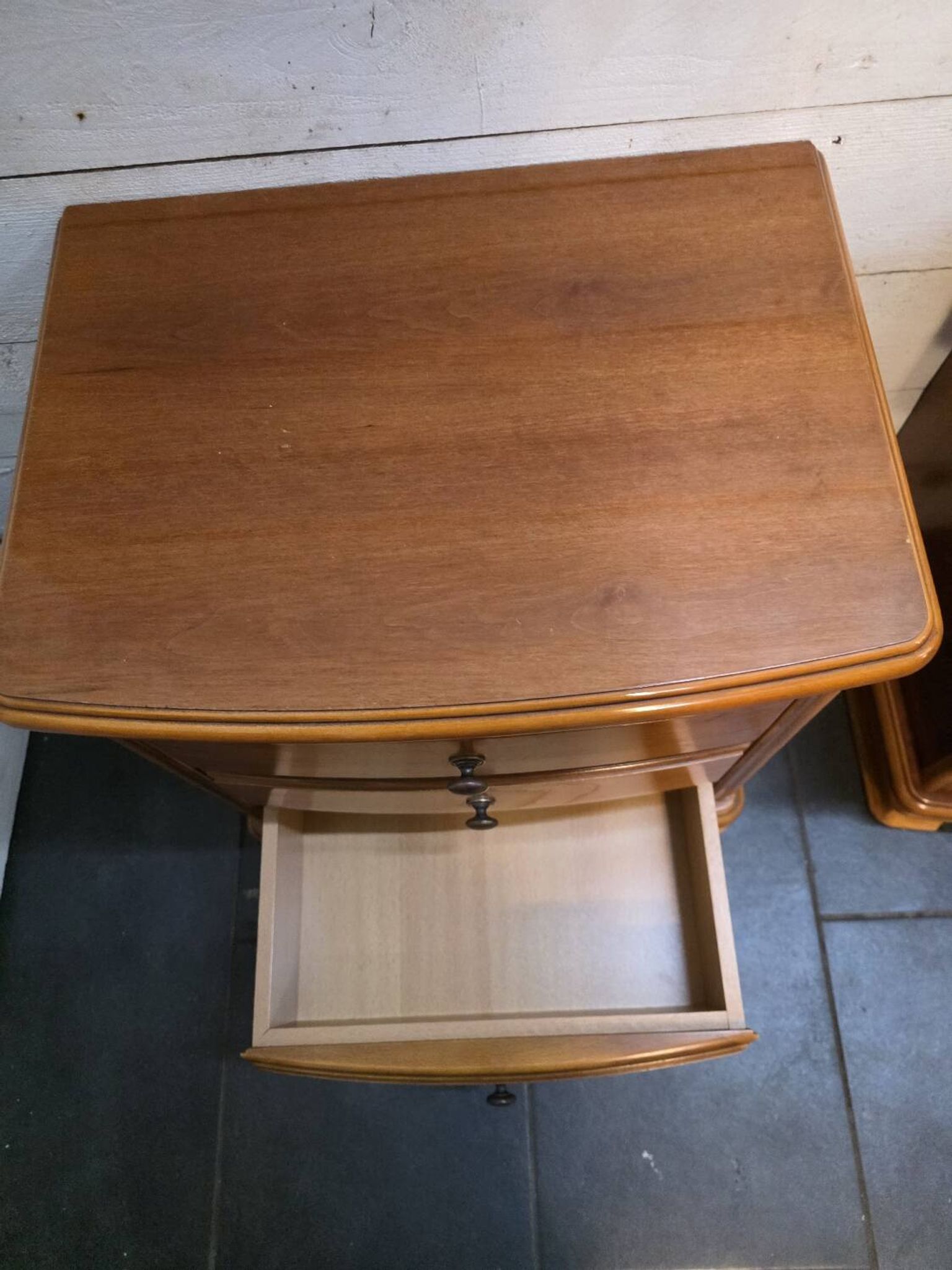 Pair of Louis Philippe style bedside tables in cherry wood.