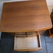 Pair of Louis Philippe style bedside tables in cherry wood.