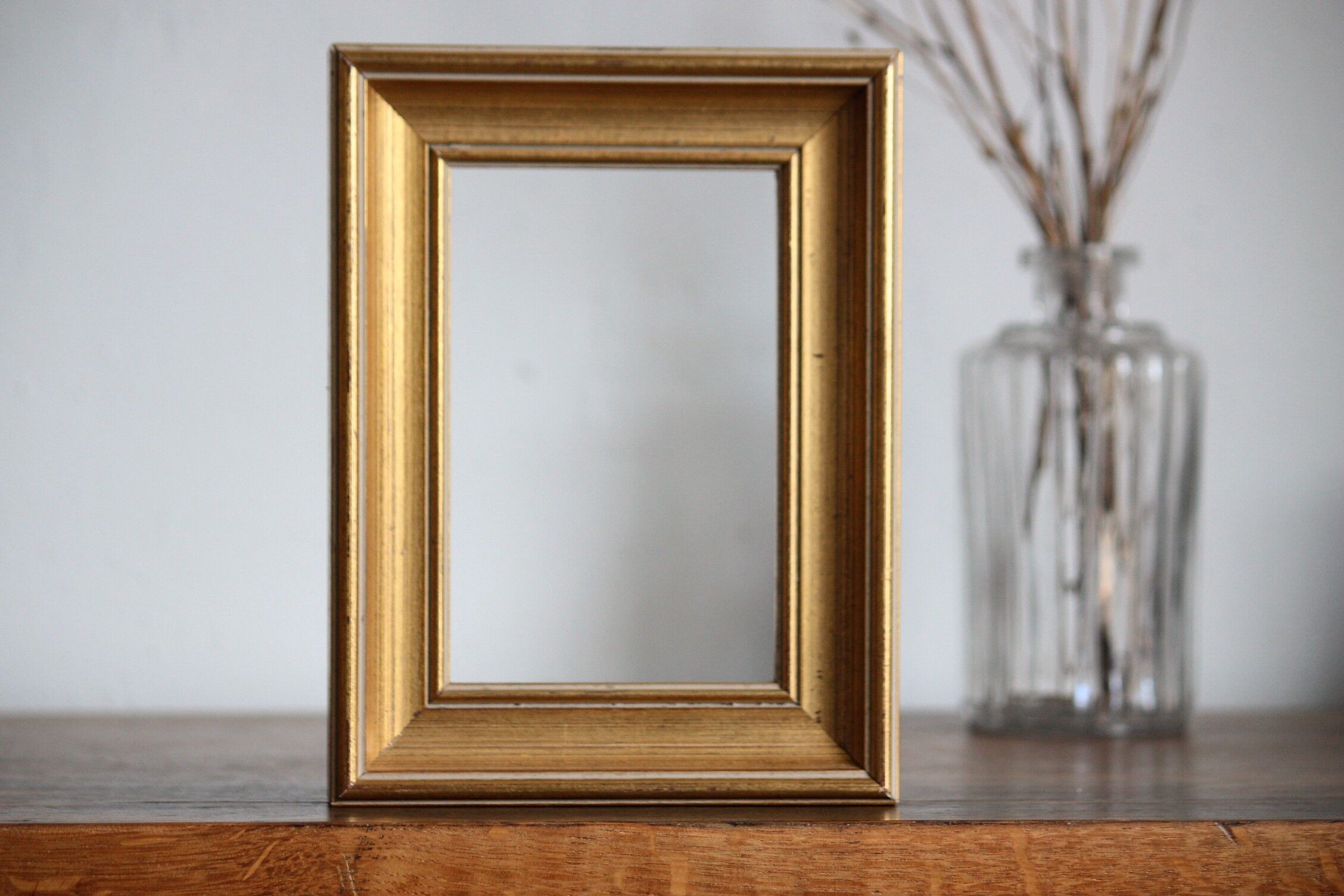 Moulded gilded wood frame