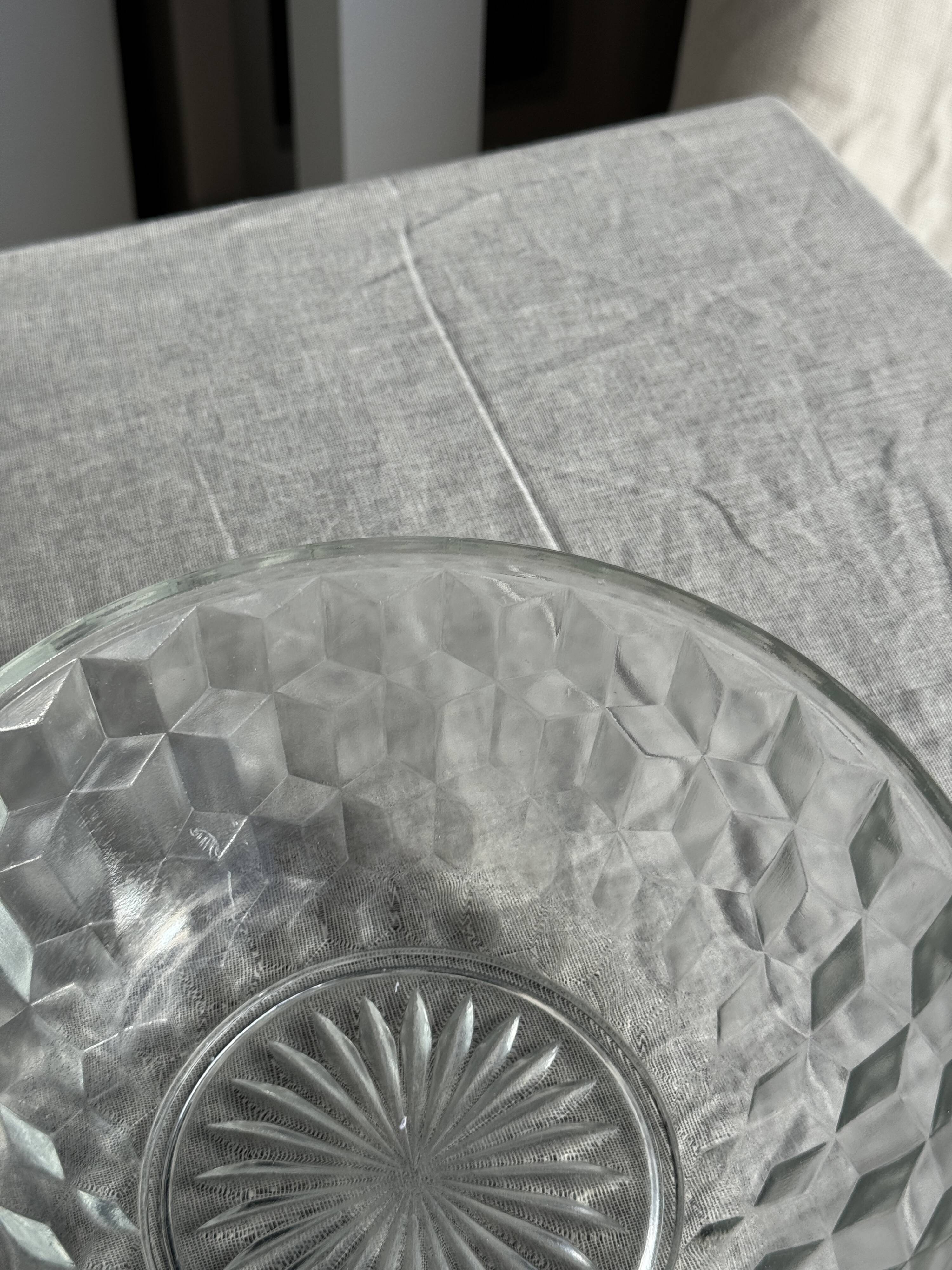 Small vintage glass bowl with a cube pattern.