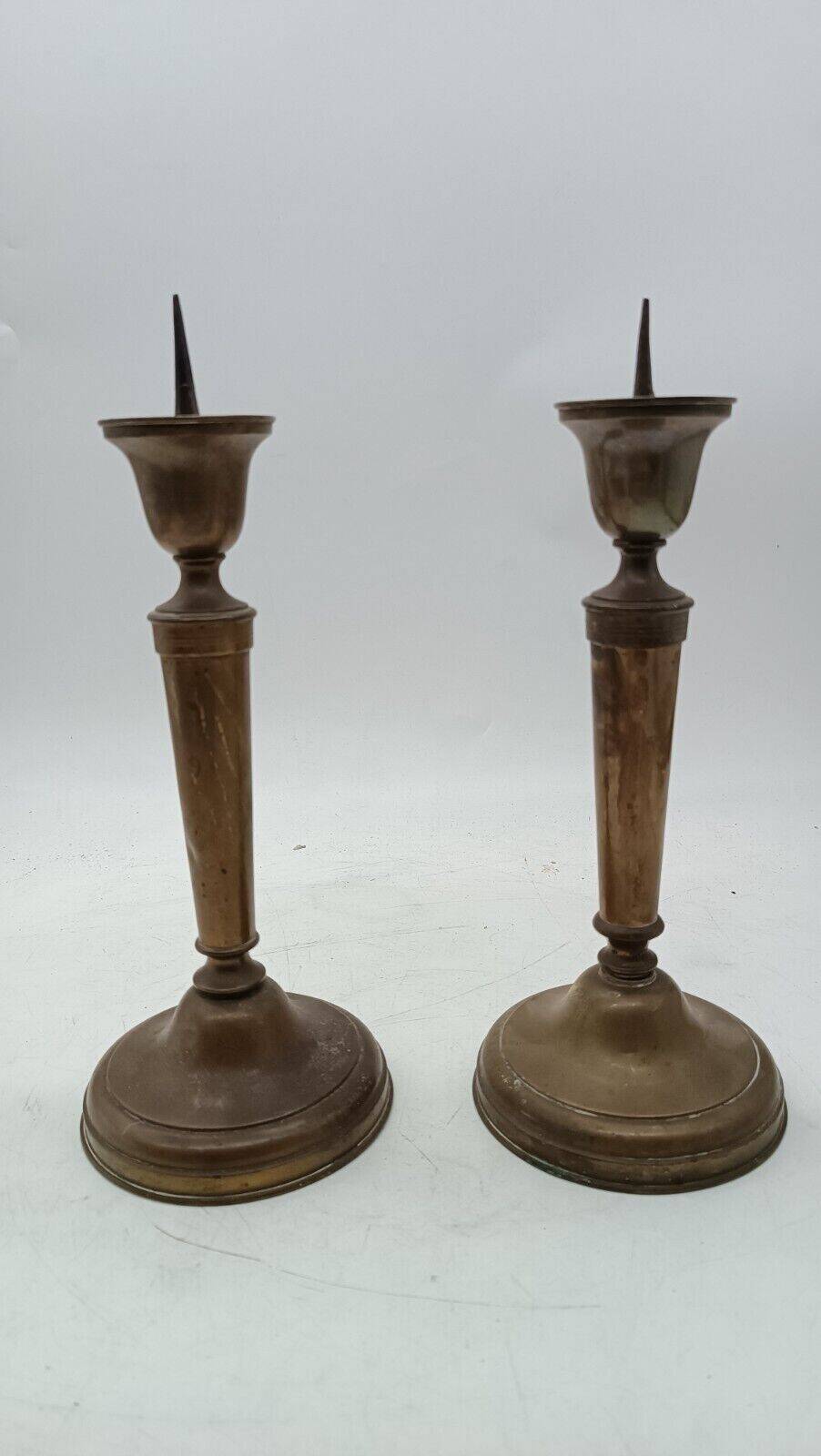 Pair of antique bronze candelabras