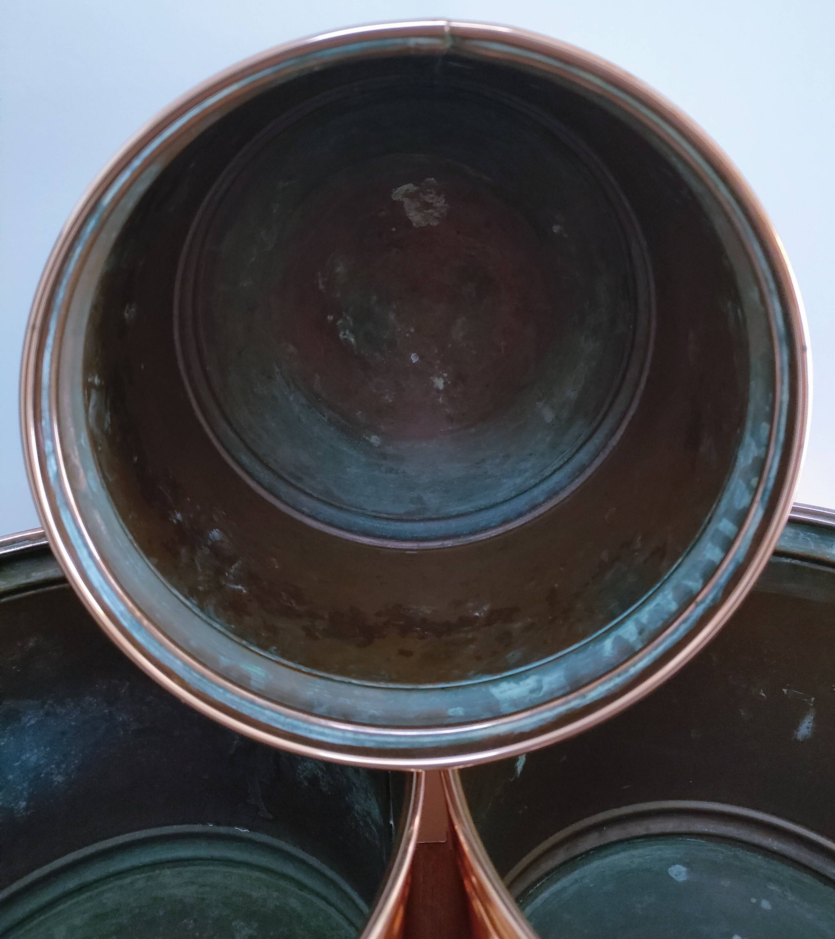 three cylindrical plant pots in a Scandinavian design from the 80s