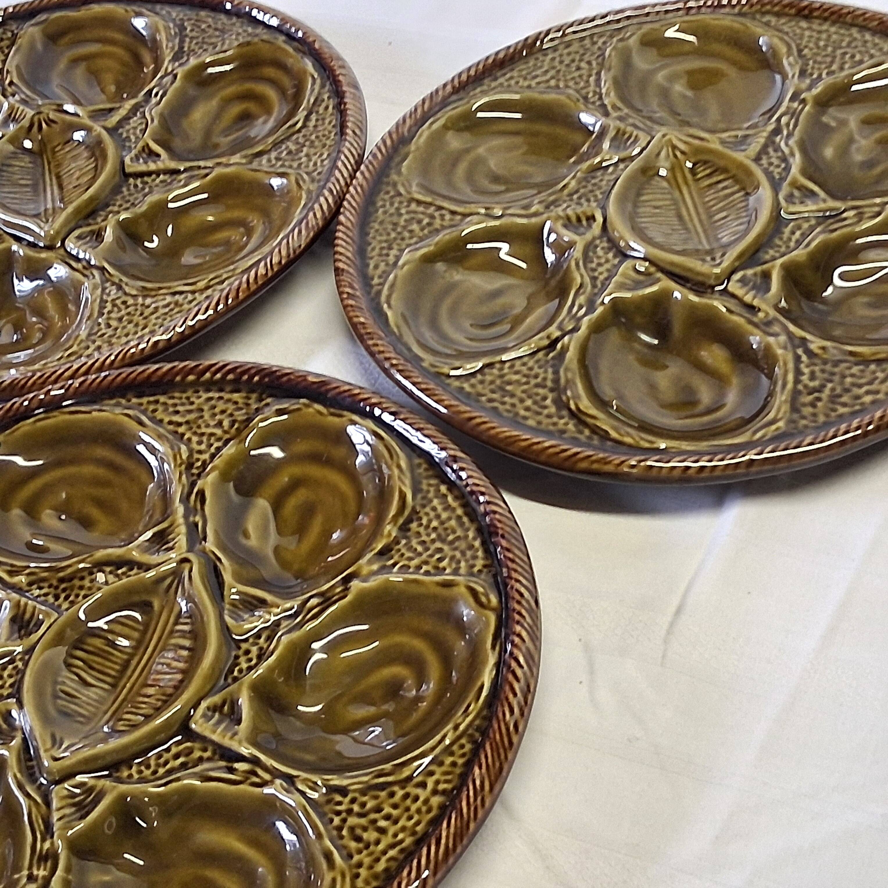 3 green majolica oyster plates from St Clément in good condition.