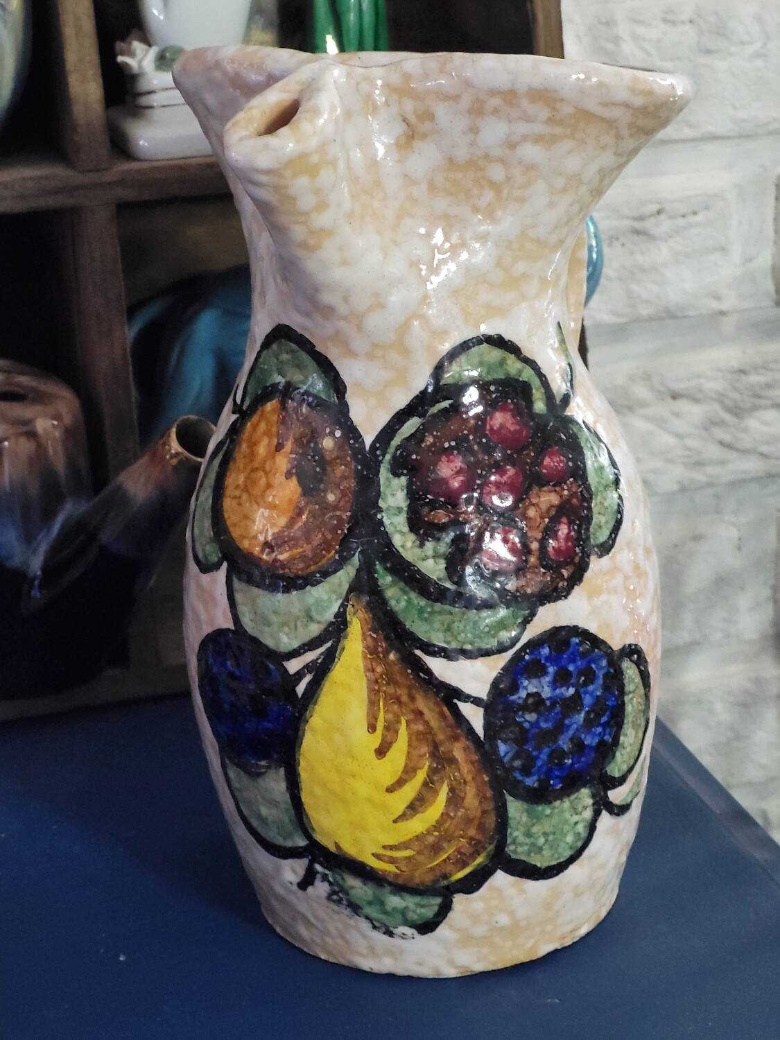 Pitcher decorated with fruit
