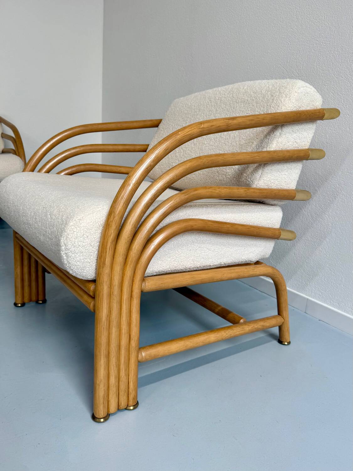 Complete living room with rattan sofa and white bouclette, brass finish, 80's design