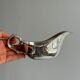 antique metal sauceboat with candle warmer and ladle