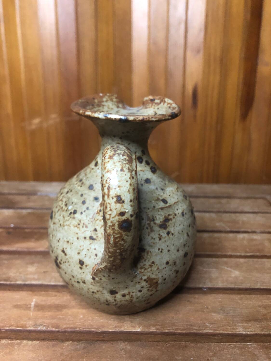 Old vintage brown stoneware pitcher