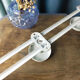 Wall-mounted coat rack three hooks