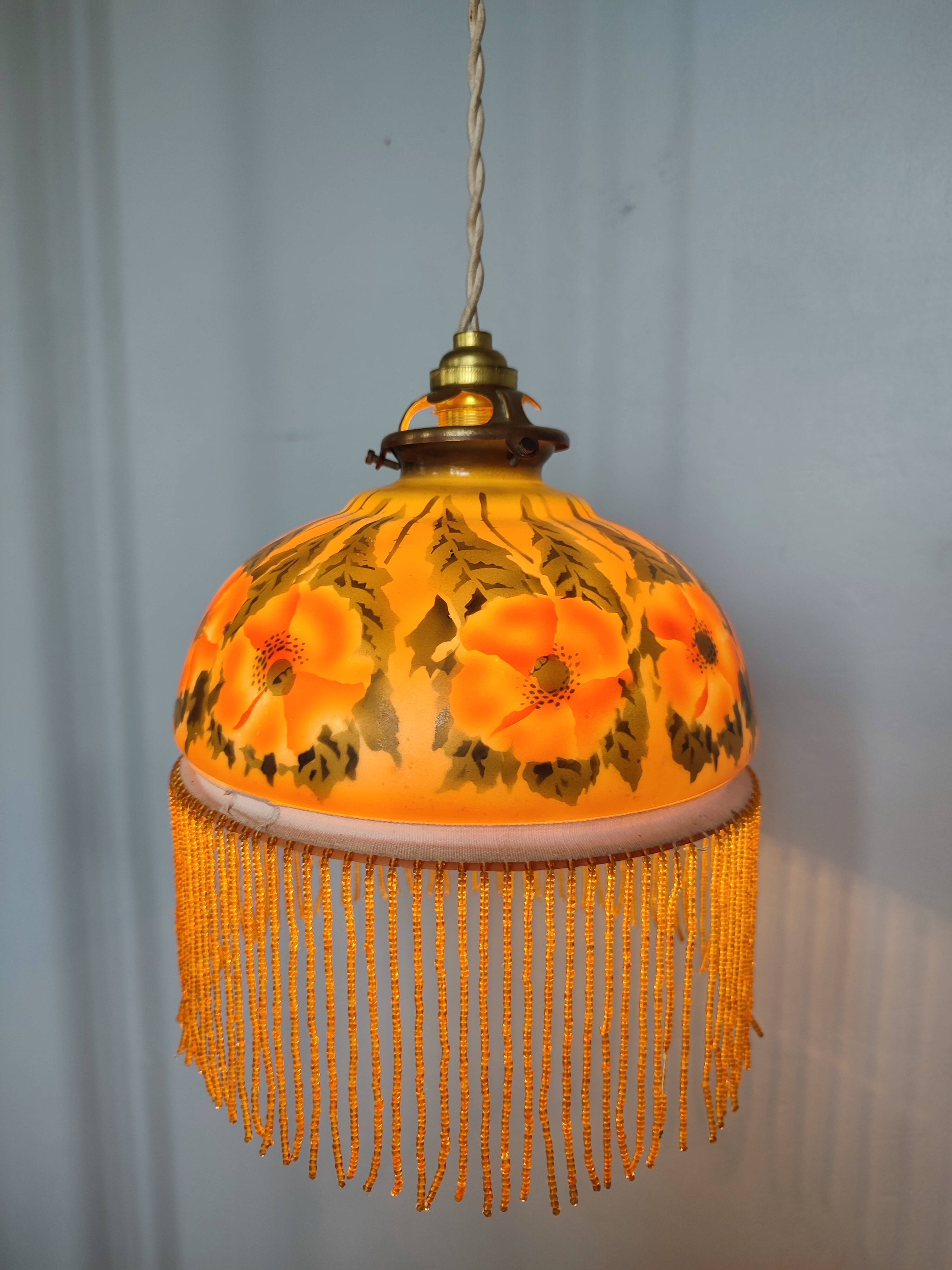 Old opaline and its tassels hanging lamp