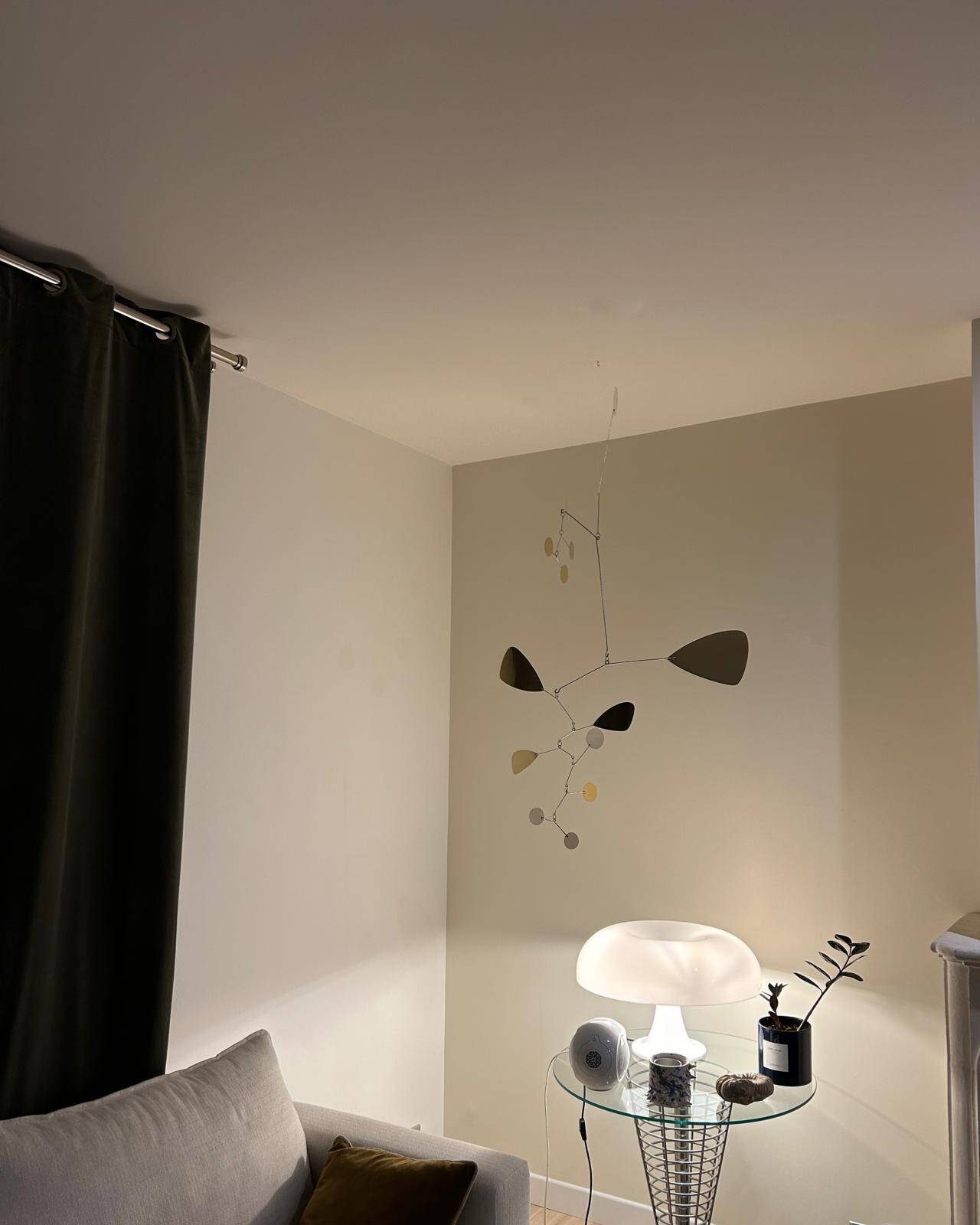 Very large mobile brass sculpture