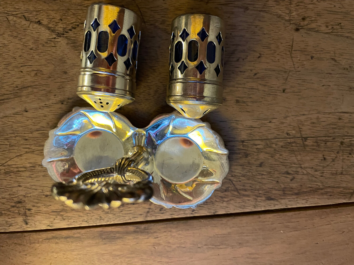 Vintage pepper shaker duo