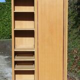 Small Scandinavian wardrobe with sliding doors - 1 side for hanging clothes.