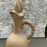 Pitcher with sandstone cap