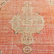 Tapis vintage rouge pâle