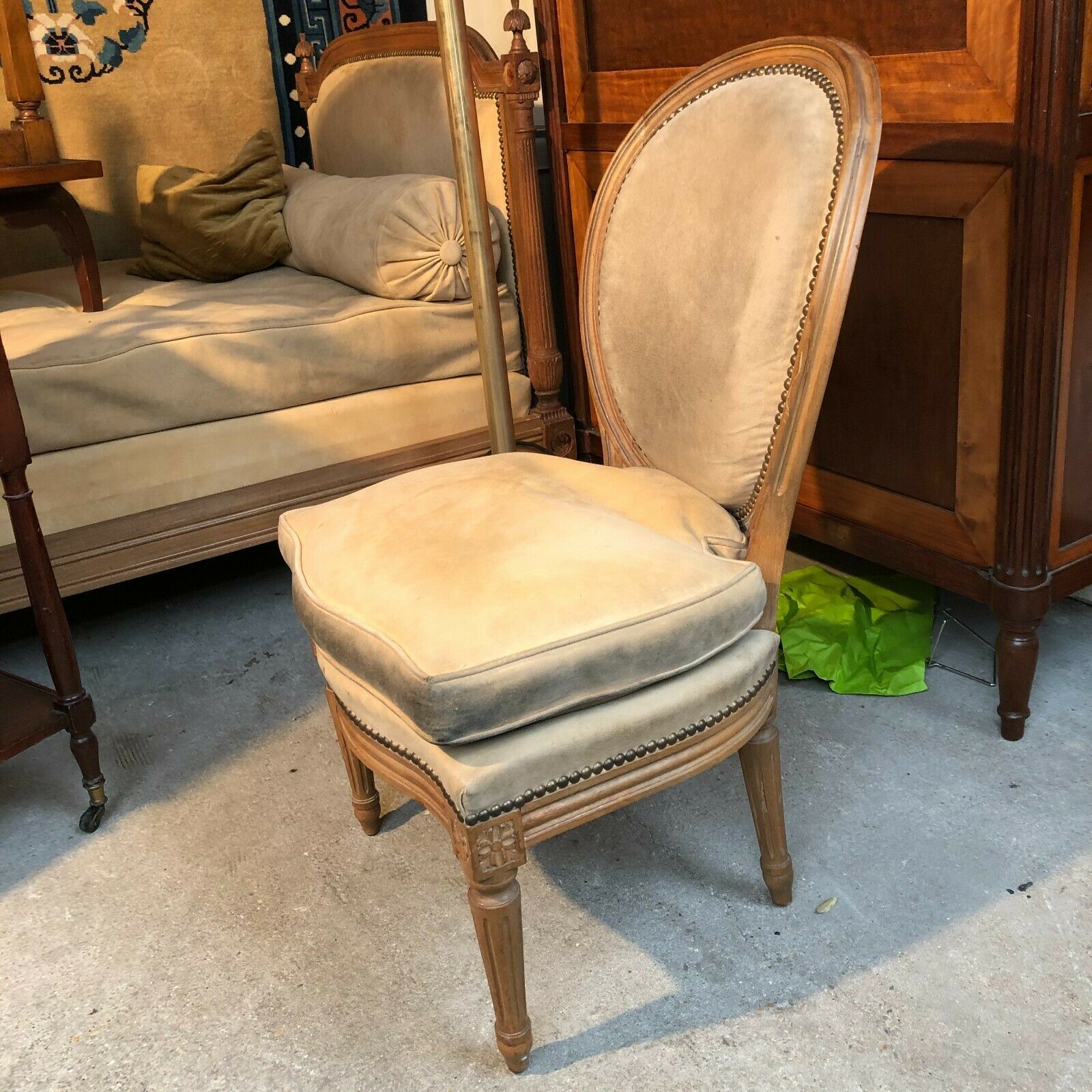 Low chair or medallion-backed heater