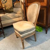 Chaise basse ou chauffeuse à dossier médaillon