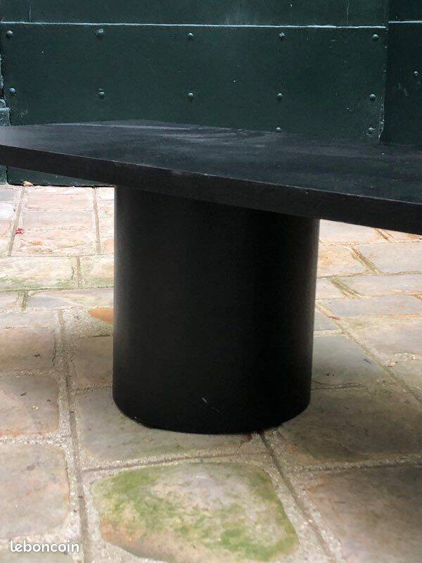 Rectangular coffee table in stained black wood with ball and cylindrical legs.