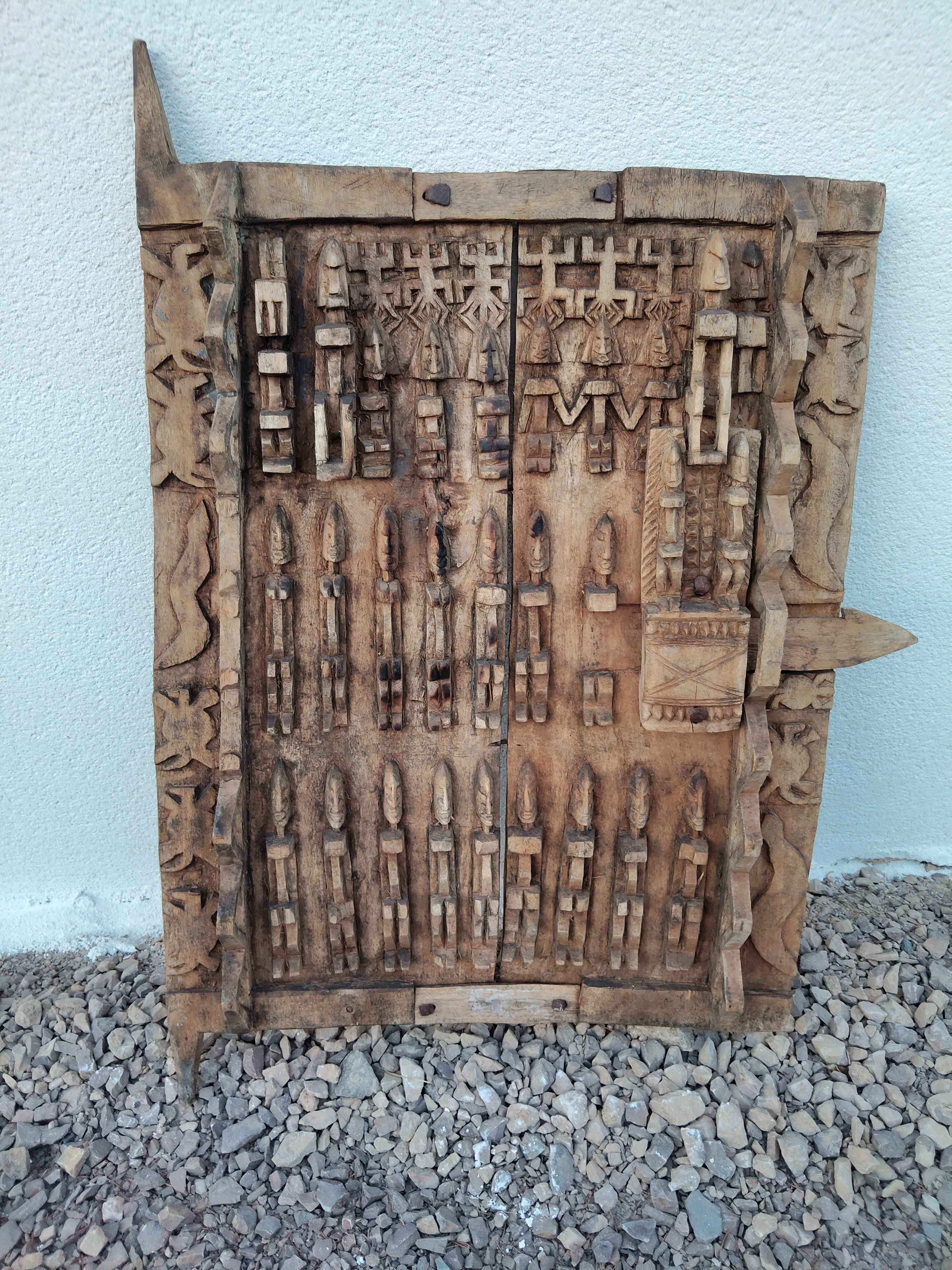 Old carved Dogon attic door – Mali – traditional lock