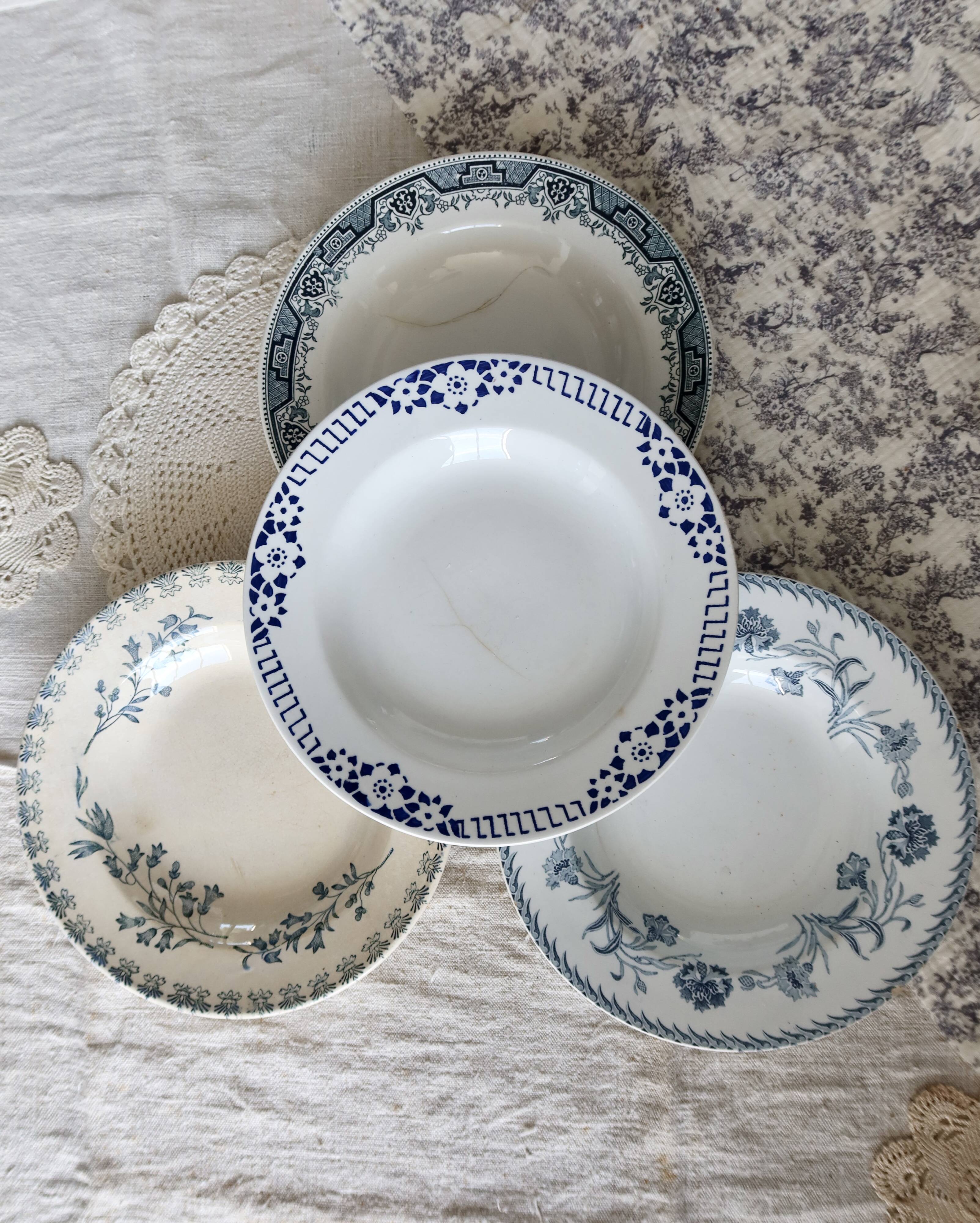 4 vintage blue ironstone soup plates