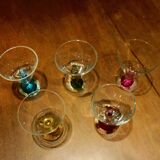 5 small glasses with colored bubble inclusions