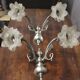 Pair of wall sconces with 2 light arms